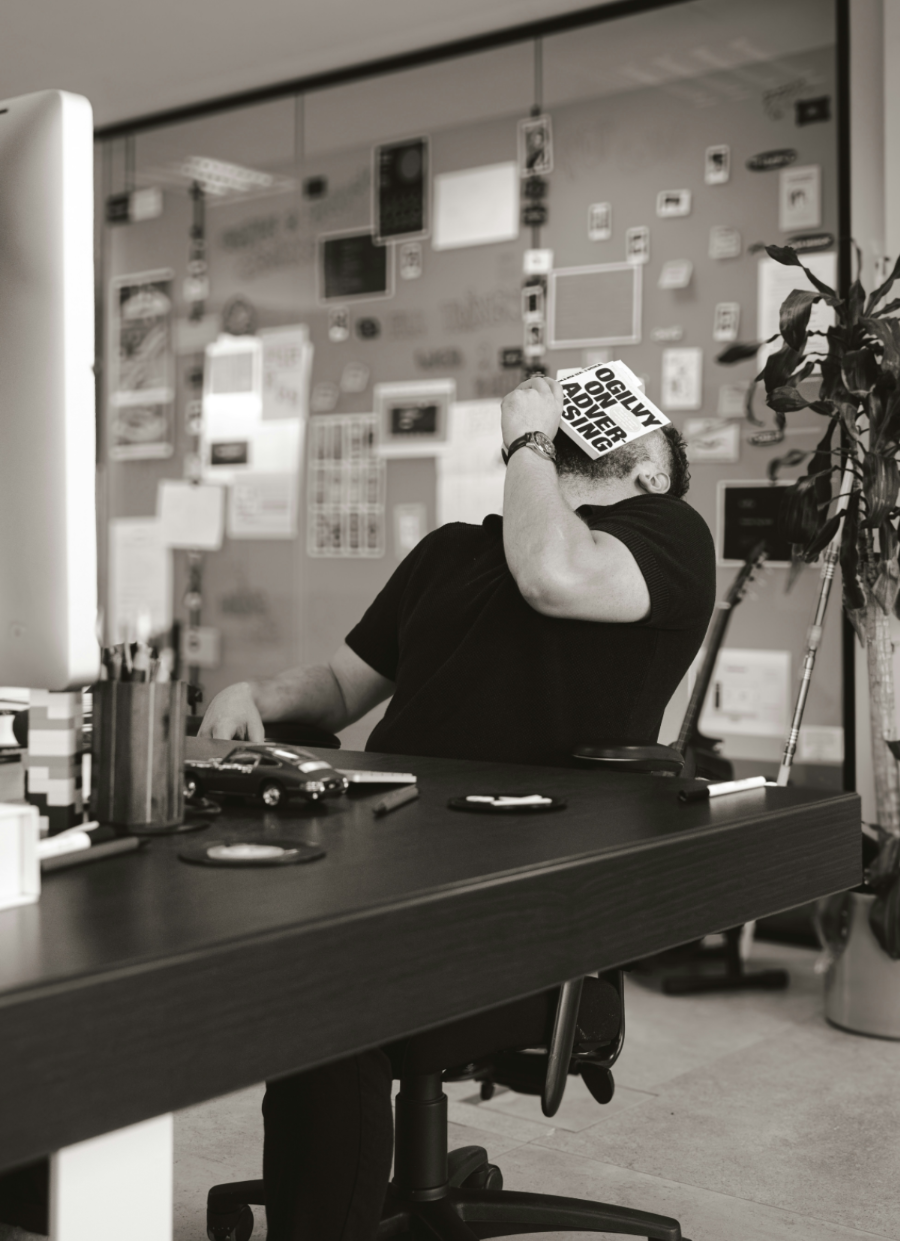 Creative business owner experiencing decision fatigue — the moment a creative business coach can help most